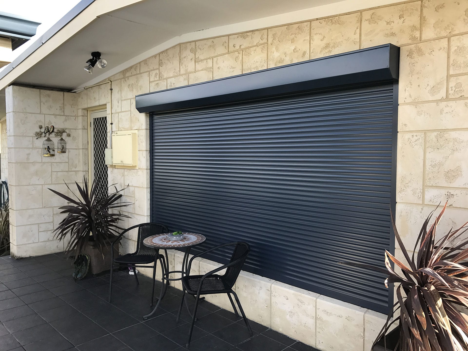 Custom roller shutters installed on a Perth home